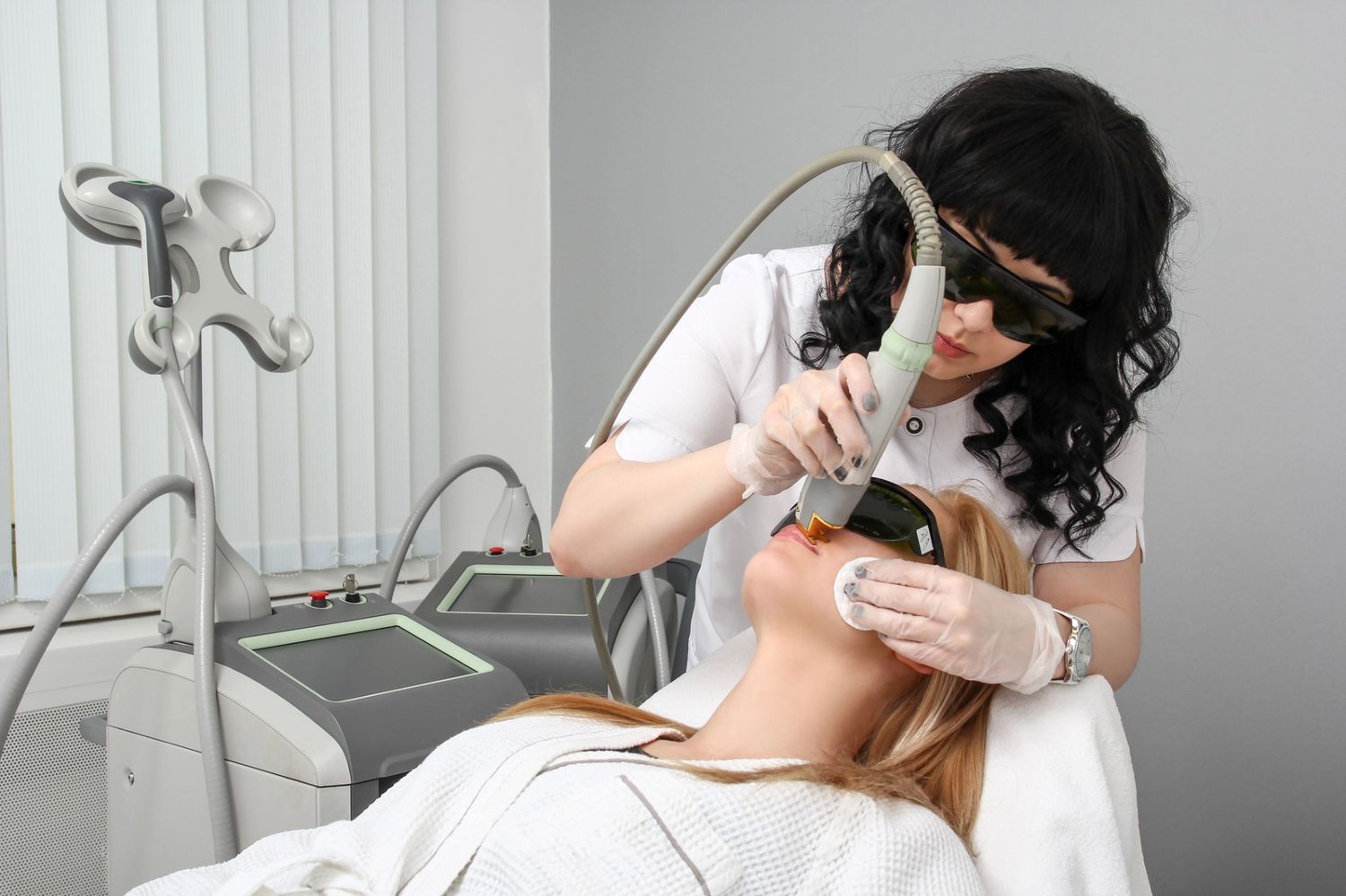 Laser hair removal course San Antonio—facial procedure with dual laser machines in professional training clinic