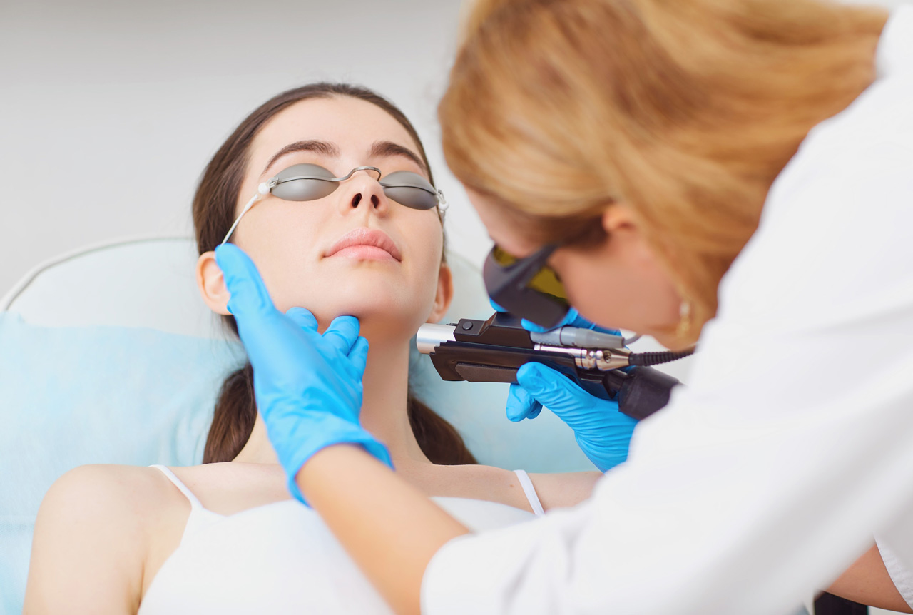 Clinical laser hair removal technician training Woodlands module demonstrating safe facial procedures with protective eyewear.